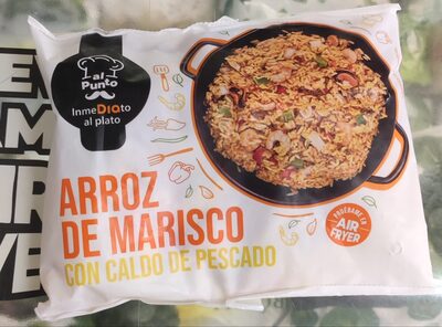 Foto de Arroz de marisco con caldo de pescado