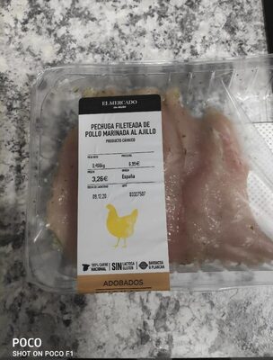 Foto de Pechuga fileteada de pollo marinada al ajillo