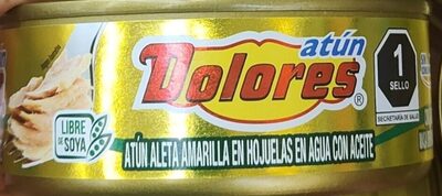 Foto de Atún aleta amarilla en hojuelas en agua con aceite