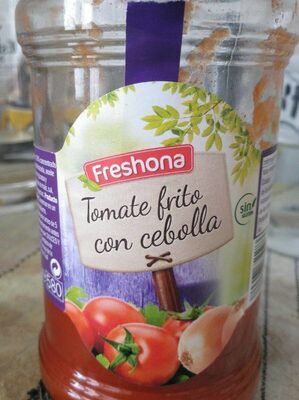 Foto de Tomate frito con cebolla