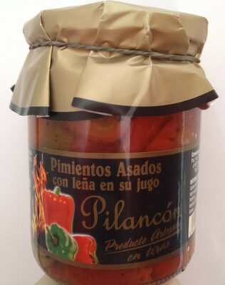 Foto de Pimientos asados con leña en su jugo