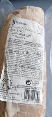 Foto de Redondo de pavo crudo relleno de ciruelas y piñones